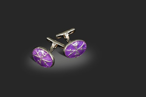 Lot 164 - Asprey, a pair of enamelled 'A' cufflinks