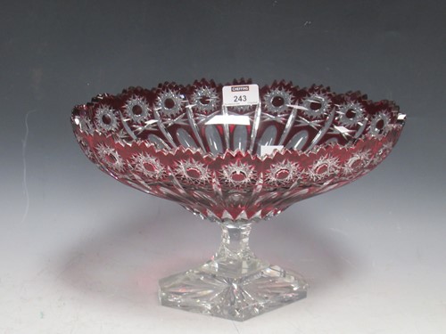 Lot 243 - A ruby and clear glass comport, of oval form...