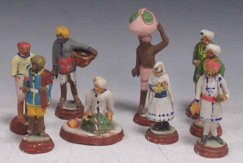Lot 244 - A collection of Indian terracotta figures,...