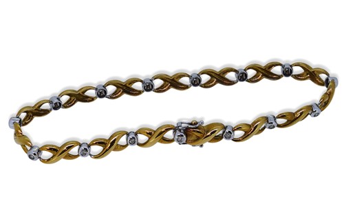 Lot 75 - A 9ct gold diamond set bracelet