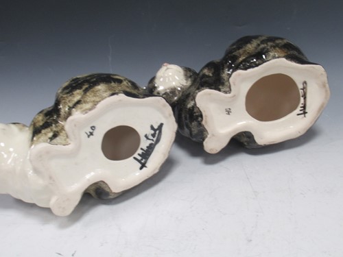 Lot 75 - A pair of Jenny Winstanley pottery cats with...
