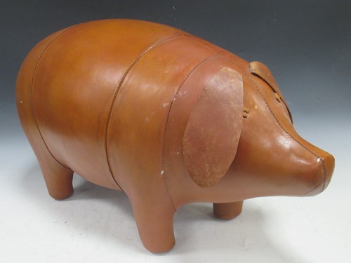 Lot 238 - A leather footstool in the form of a pig,...