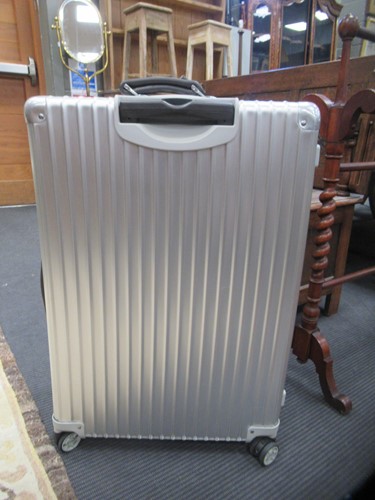 Lot 247 - Two RIMOWA suitcases on wheels, 71 x 47cm and...
