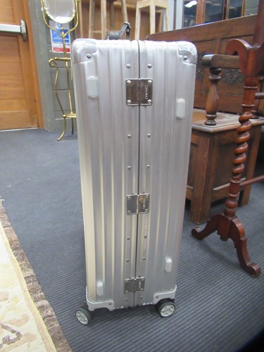 Lot 247 - Two RIMOWA suitcases on wheels, 71 x 47cm and...