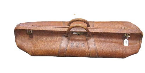 Lot 251 - An early 20th century leather cricket...