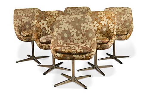 Lot 269 - A set of six swivel dining chairs, 1970s