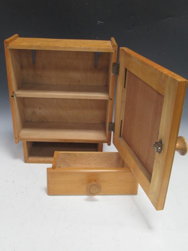 Lot 123 - An Art Deco bathroom cabinet with fan-shaped...