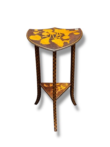 Lot 685 - A poker work shield shaped table dated 1902,...