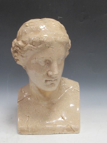 Lot 63 - A ceramic bust of a classical maiden,...