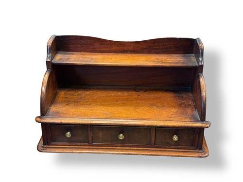 Lot 697 - An Edwardian mahogany table top desk tidy with...
