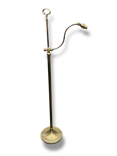 Lot 675 - A brass adjustable lamp, 123cm high