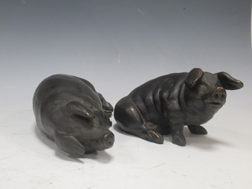 Lot 279 - David Selby, two bronzed model pigs, (one...