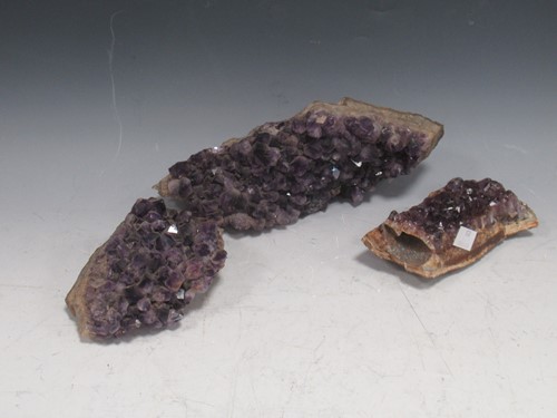 Lot 276 - Three pieces of amethyst in natural form