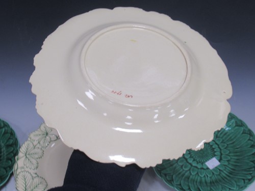 Lot 277 - A collection of four majolica plates with...