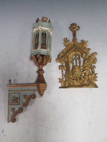 Lot 281 - A gilt metal hanging relief of bears stealing...