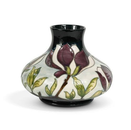 Lot 34 - A large modern Moorcroft Wine Magnolia pattern vase