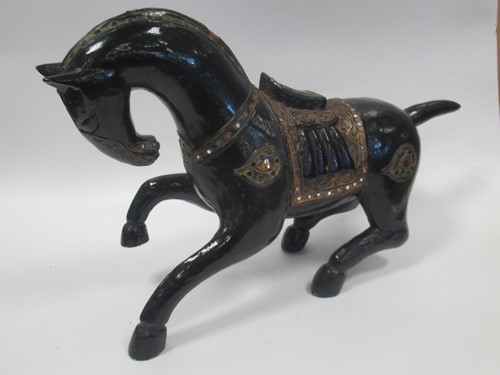 Lot 6 - A Thai glazed and embellished terracotta horse