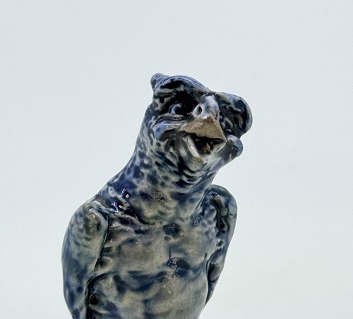 Lot 21 - Robert Wallace Martin for the Martin Brothers, a miniature stoneware bird, 1912-1913