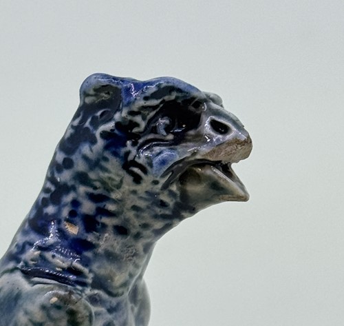 Lot 21 - Robert Wallace Martin for the Martin Brothers, a miniature stoneware bird, 1912-1913