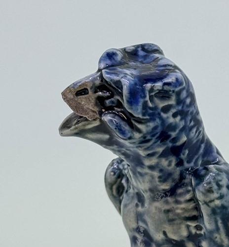 Lot 21 - Robert Wallace Martin for the Martin Brothers, a miniature stoneware bird, 1912-1913