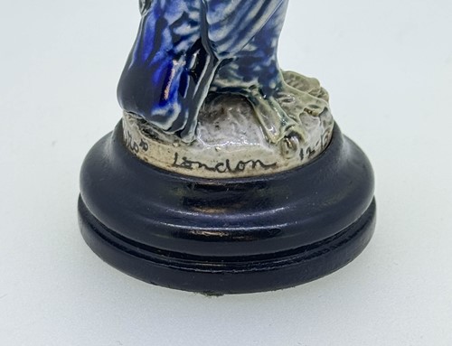 Lot 21 - Robert Wallace Martin for the Martin Brothers, a miniature stoneware bird, 1912-1913