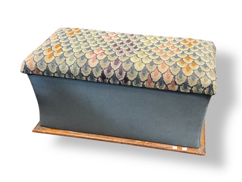 Lot 556 - A walnut framed box Ottoman, the hinged lid...