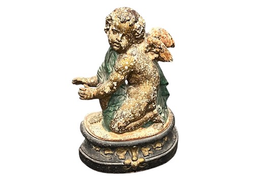 Lot 582 - A painted cast iron door stop / andiron...