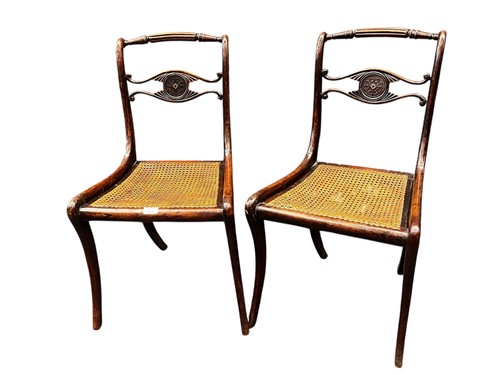 Lot 507 - A pair of Regency simulated rosewood sabre leg...