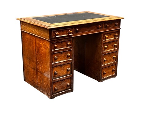 Lot 741 - An oak pedestal desk, circa 1900, comprising...