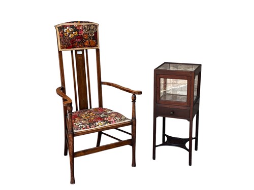 Lot 680 - An Arts and Crafts style high backed chair,...