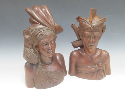 Lot 142A - A pair of mid 20th century Malayan carved wood...