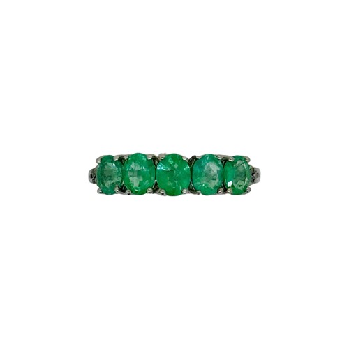 Lot 8 - A 9ct gold five stone emerald ring