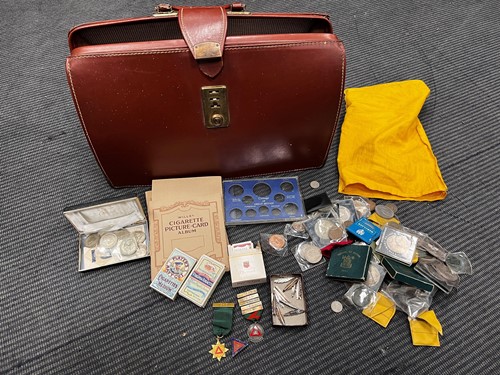Lot 378 - A suitcase containing various silver and other...