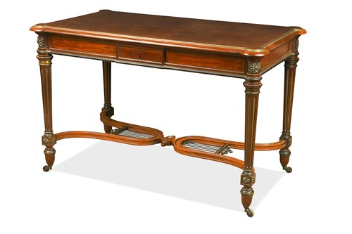 Lot 479 - A Louis XVI style mahogany library table