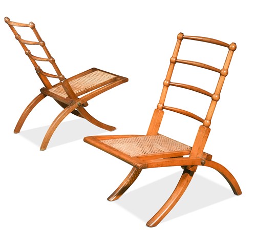 Lot 175 - In the manner of E.W.Godwin, a pair of Aesthetic movement 'campaign' chairs, circa 1880