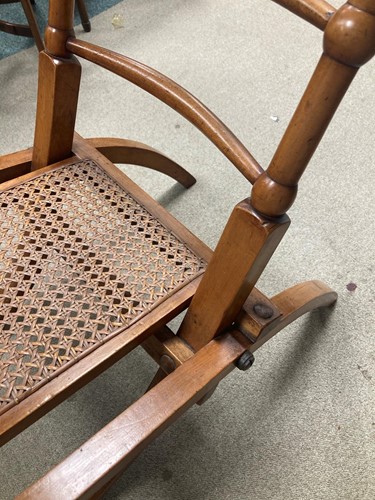 Lot 175 - In the manner of E.W.Godwin, a pair of Aesthetic movement 'campaign' chairs, circa 1880