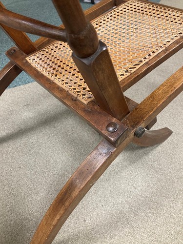 Lot 175 - In the manner of E.W.Godwin, a pair of Aesthetic movement 'campaign' chairs, circa 1880