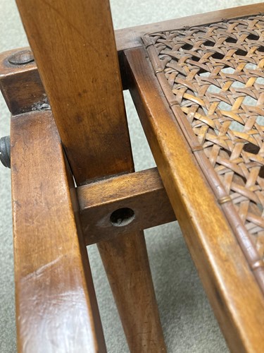 Lot 175 - In the manner of E.W.Godwin, a pair of Aesthetic movement 'campaign' chairs, circa 1880
