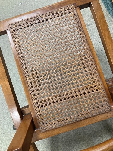 Lot 175 - In the manner of E.W.Godwin, a pair of Aesthetic movement 'campaign' chairs, circa 1880