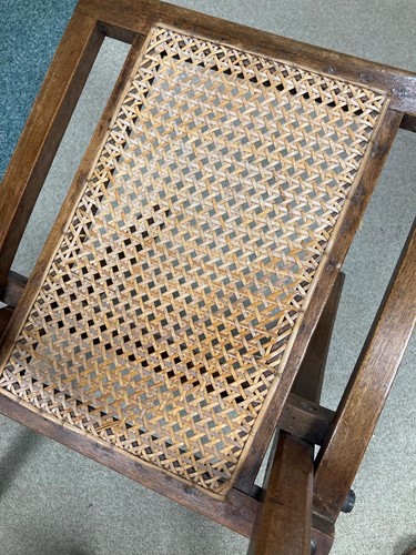 Lot 175 - In the manner of E.W.Godwin, a pair of Aesthetic movement 'campaign' chairs, circa 1880