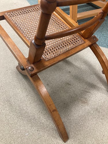 Lot 175 - In the manner of E.W.Godwin, a pair of Aesthetic movement 'campaign' chairs, circa 1880