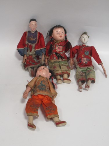 Lot 126 - Two pairs of Chinese dolls in oriental dress,...