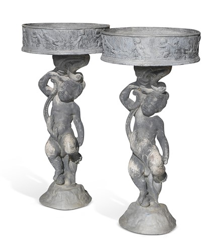 Lot A pair of lead cherub figures, late 19th century