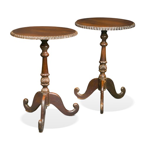 Lot 505 - A pair of Ceylonese hardwood tripod tables, 19th century