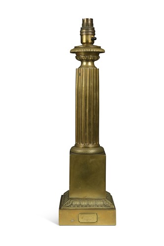 Lot 385 - A Regency style short brass column lamp