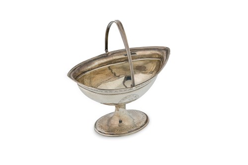 Lot 481 - Dublin - An 18th century silver swing handled sugar basket