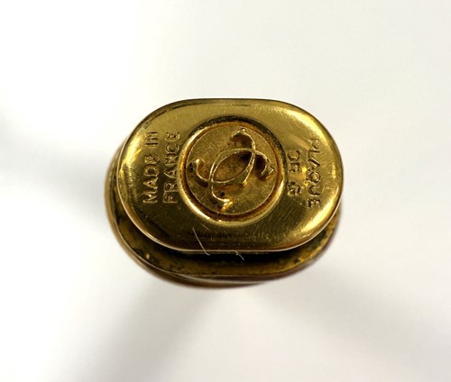 Lot 322 - Cartier - A 'Les Must de Cartier Trinity' gold-plated rollerball pen case