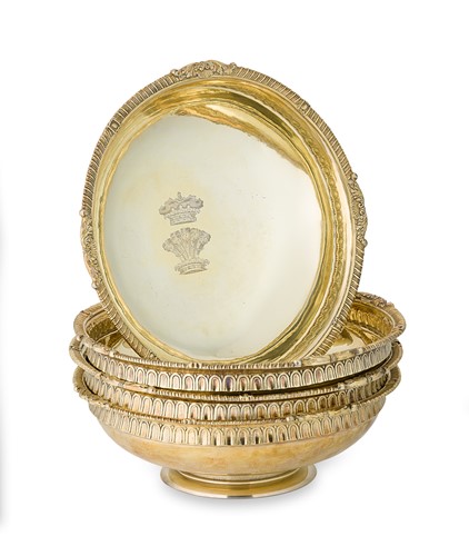 Lot 398 - A set of four George III silver gilt sweetmeat dishes