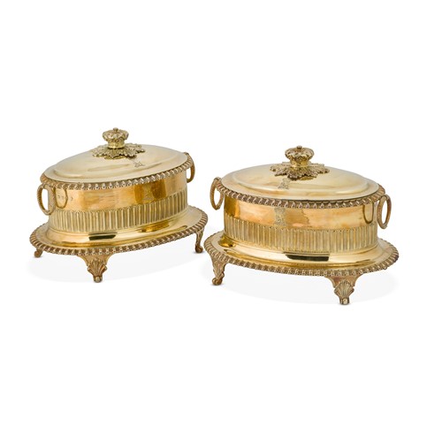 Lot 399 - A pair of George III silver gilt covered butter bowls and covers