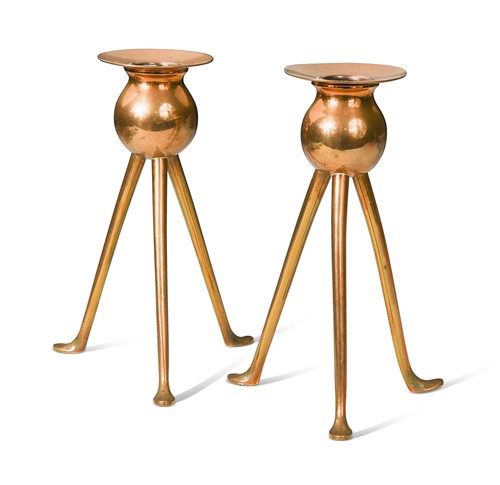 Lot 199 - Attributed to the Keswick School of Industrial Art, a pair of copper candlesticks